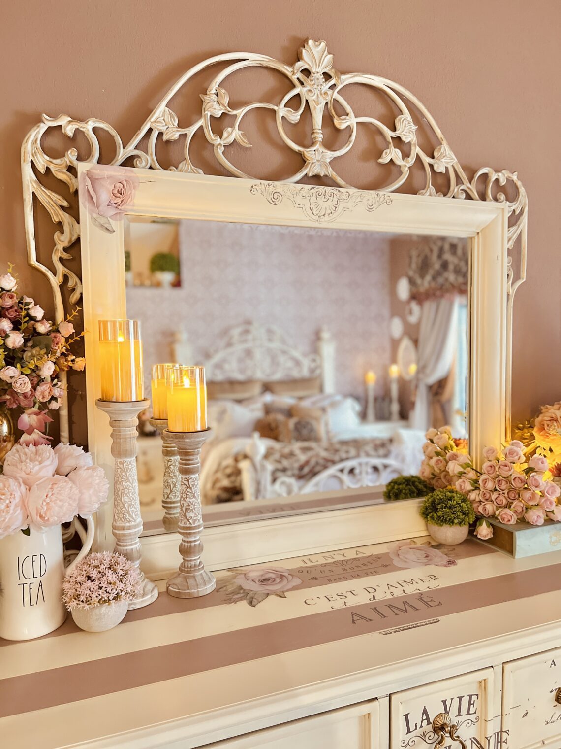 French country bedroom dresser mirror armoire furniture makeover dark antique walnut wrought iron accents home décor improvement chalk paint all in one wax glaze antique restoration before and after Provincial white cream gilding wax gold techniques tips Rae Dunn Disney Princess Mug Cinderella Bibbidi Bobbidi Boo