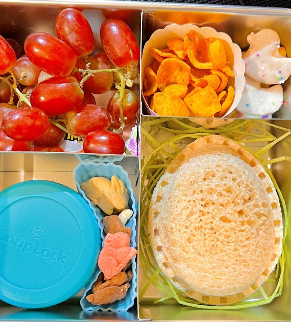 8Bento Box lunch fruit cutouts surprise egg sandwich