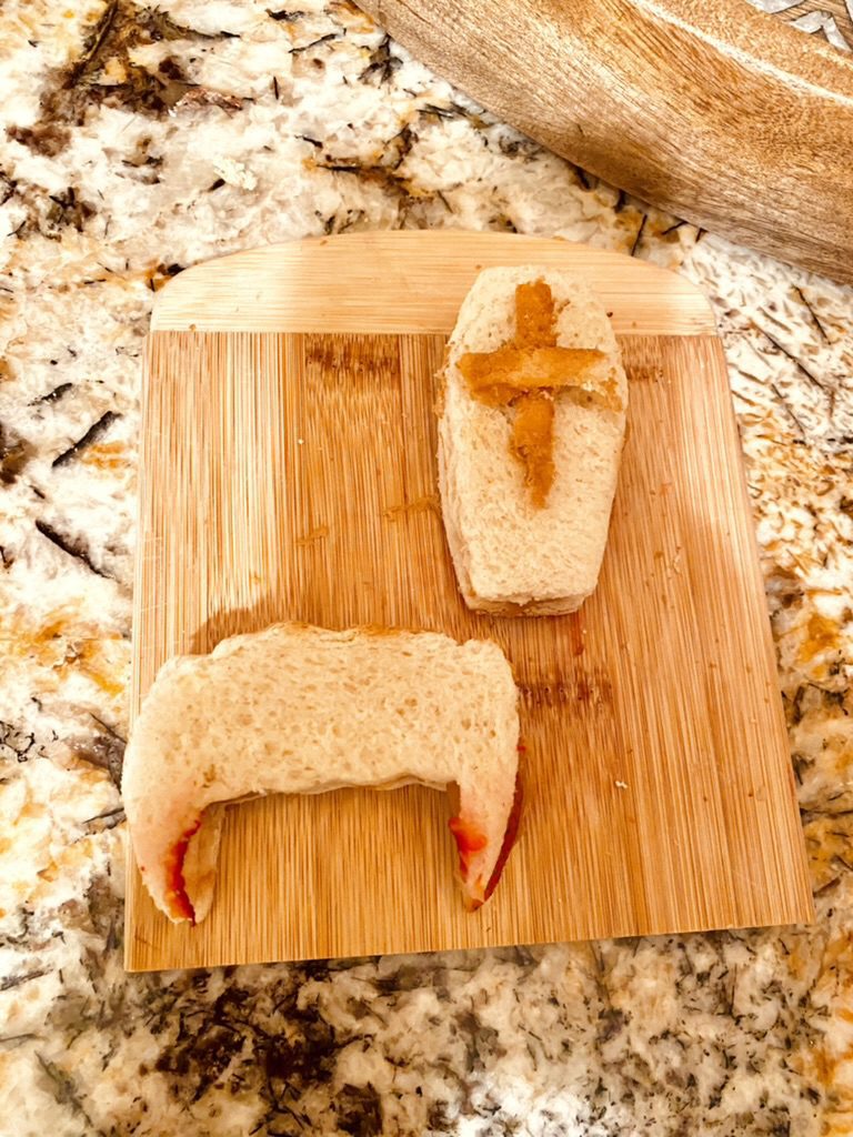 halloween cookie cutter sandwich coffin and vampire fangs peanut butter sandwich bento box lunch