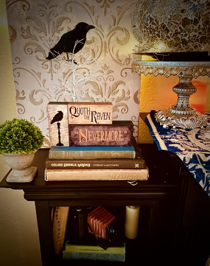 quoth the raven nevermore block signs on top of stacked books with damask art crow Halloween bookshelf decorations