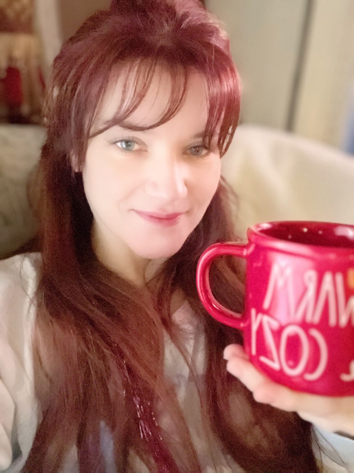 me with red Rae Dunn coffee mug warm and cozy