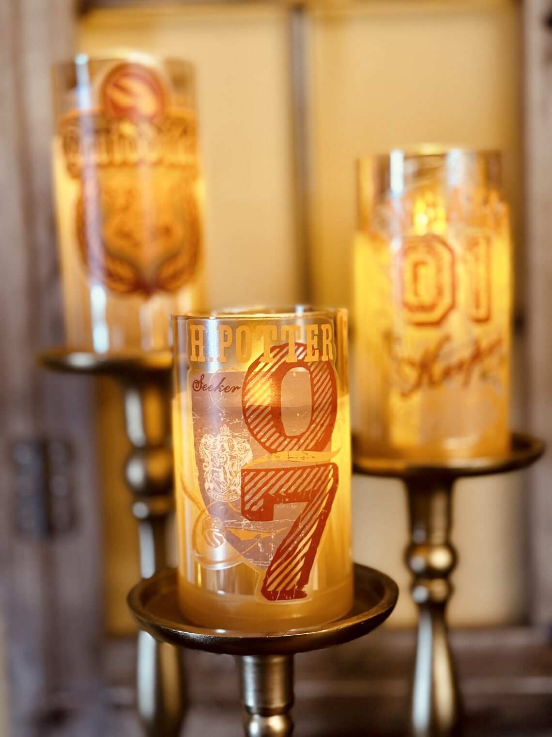 Hogwarts Harry Potter Quidditch Candles LED flickering soft glow on brass candle sticks