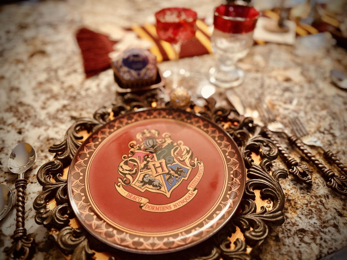 Hogwarts Harry Potter Quidditch Candles LED flickering soft glow on brass candle sticks table centerpiece hogwarts melamine house crest plates