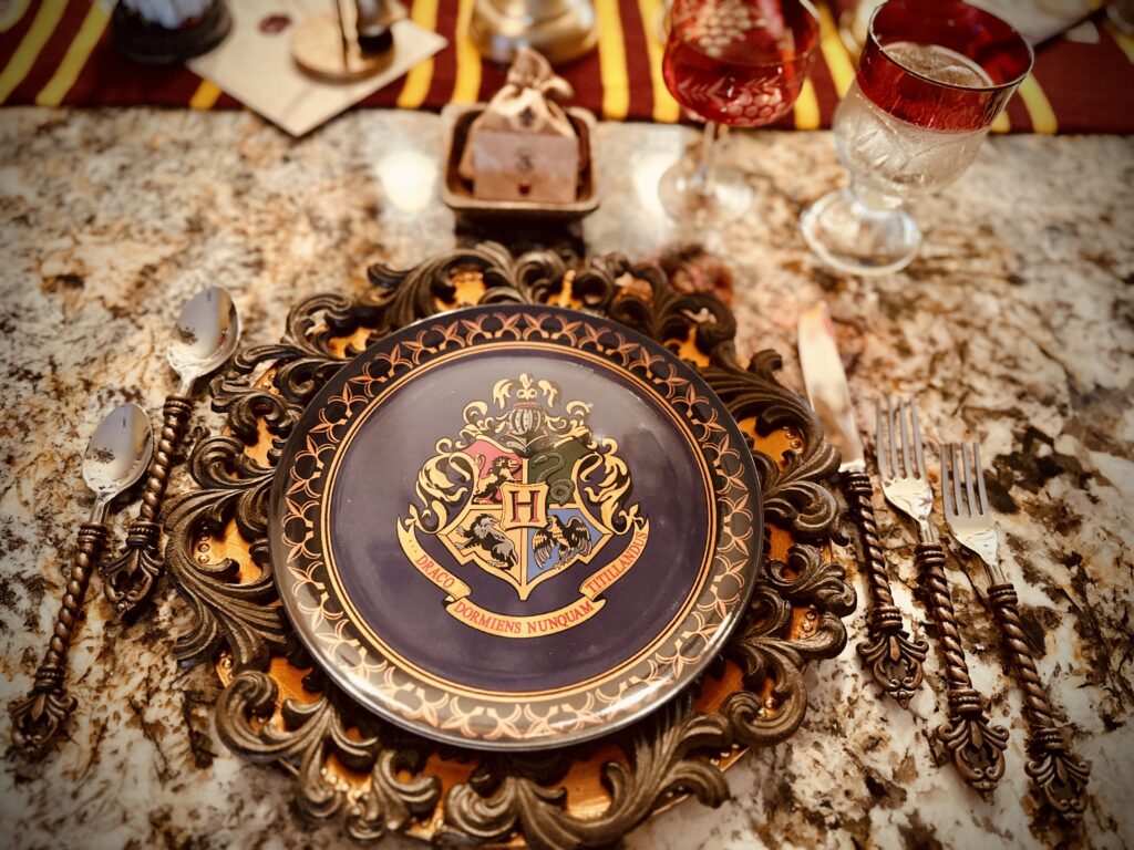 Hogwarts Harry Potter Quidditch Candles LED flickering soft glow on brass candle sticks table centerpiece hogwarts melamine house crest plates