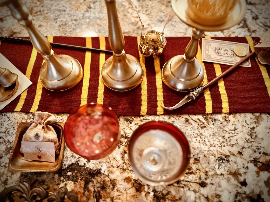 Hogwarts Harry Potter Quidditch Candles LED flickering soft glow on brass candle sticks golden snitch from pottery barn teen